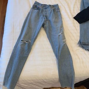 ReDone light wash denim jeans! Rip at the knee